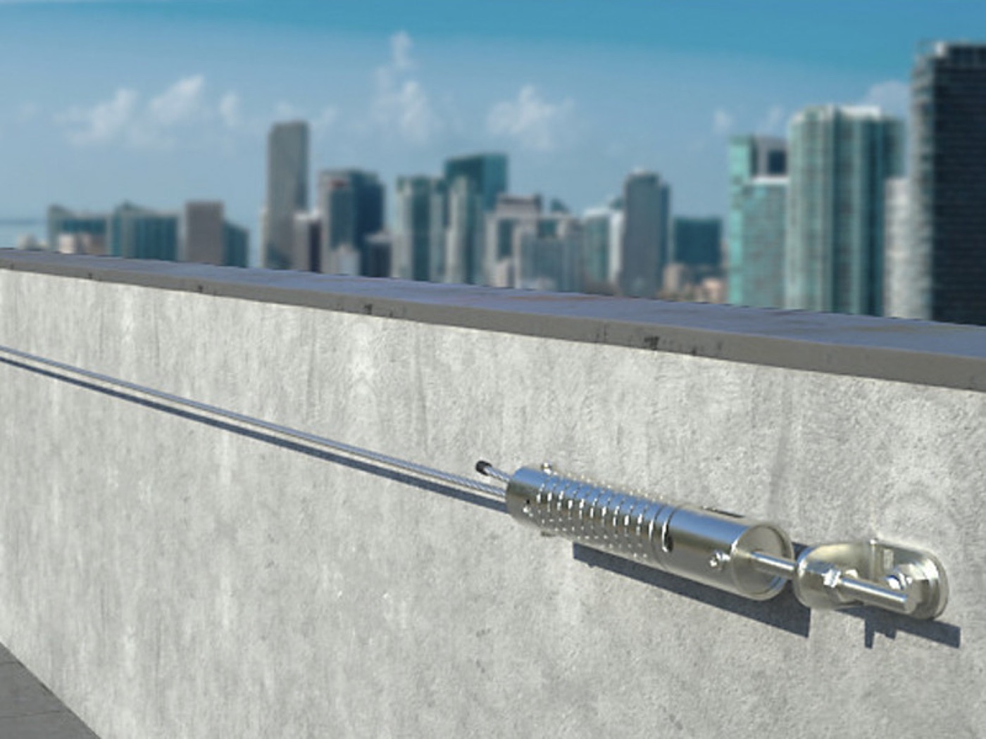 PATROL horizontal lifeline installed along a concrete facade parapet, with terminal and tensioner-absorber anchored to the wall.