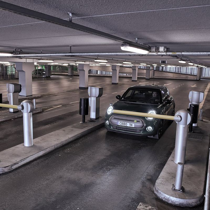 AXIS License Plate Verifier application triggering a parking barrier to open upon recognizing an authorized plate
